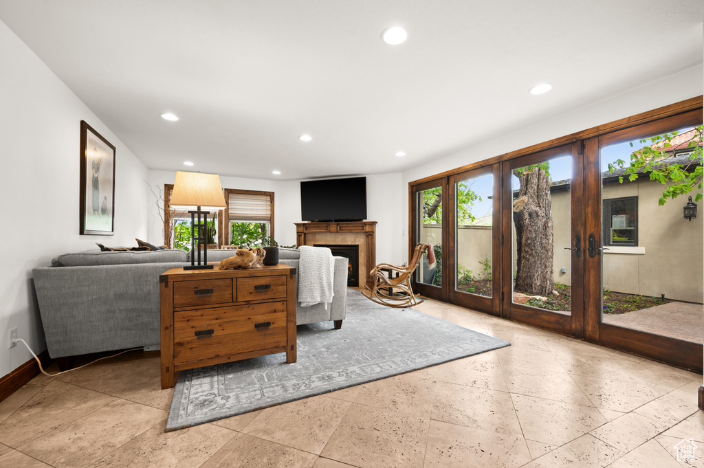 Living room featuring light tile flooring