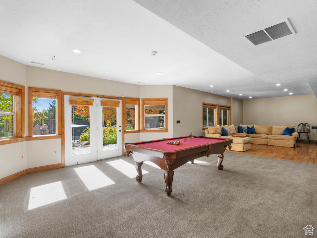 Rec room featuring french doors, carpet flooring, and pool table