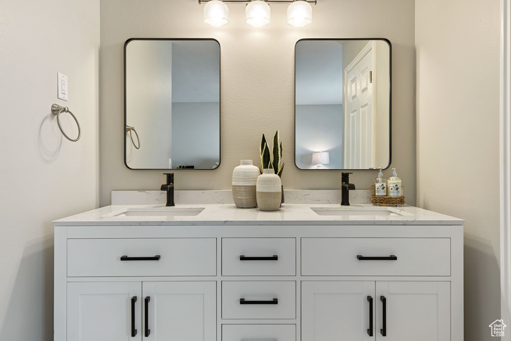 Bathroom with large vanity and double sink