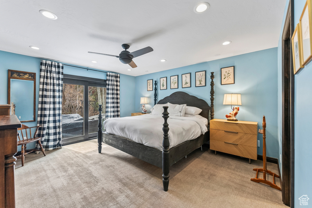 Bedroom featuring ceiling fan, carpet, and access to exterior