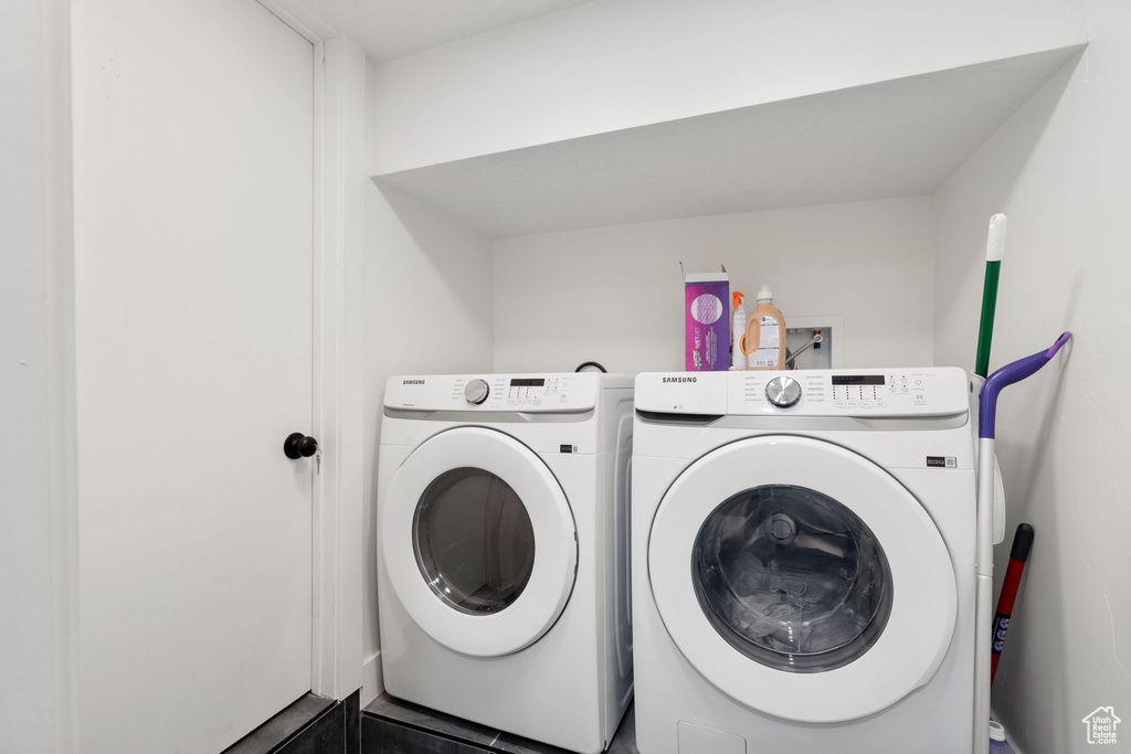 Clothes washing area with independent washer and dryer and hookup for a washing machine