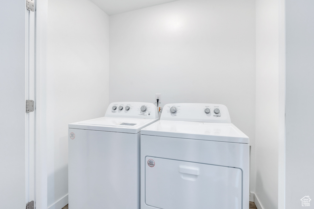Laundry room featuring independent washer and dryer