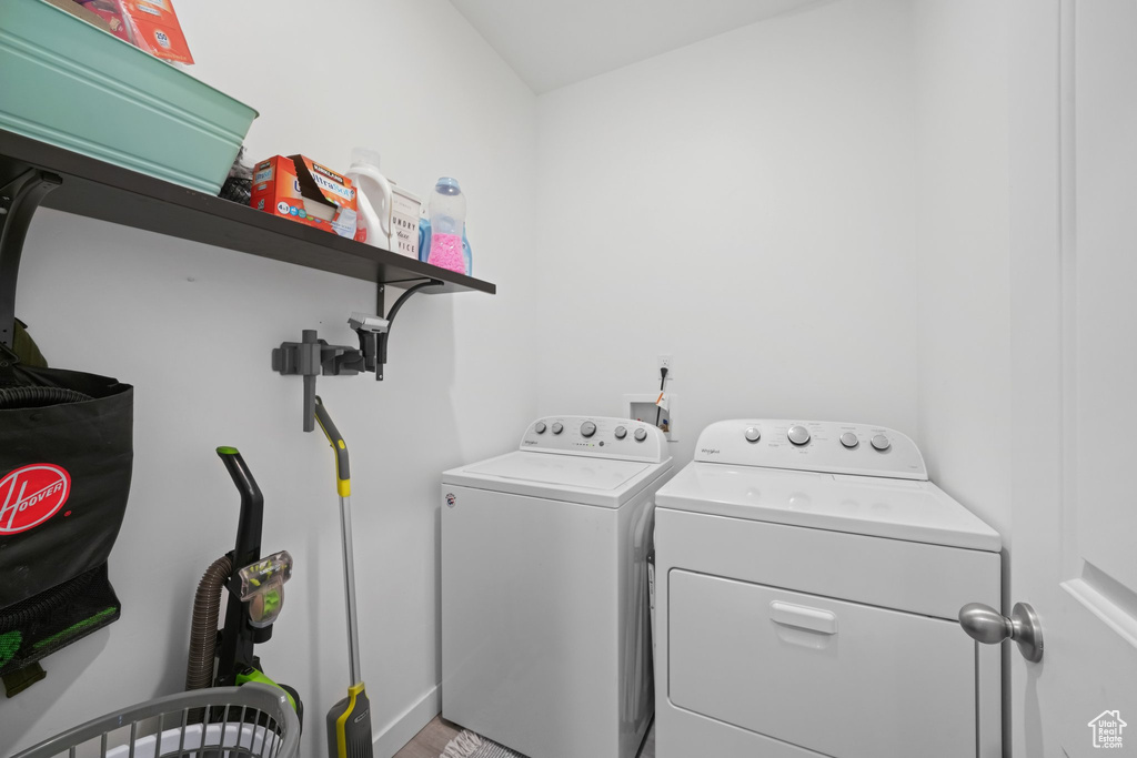 Laundry room featuring separate washer and dryer and washer hookup