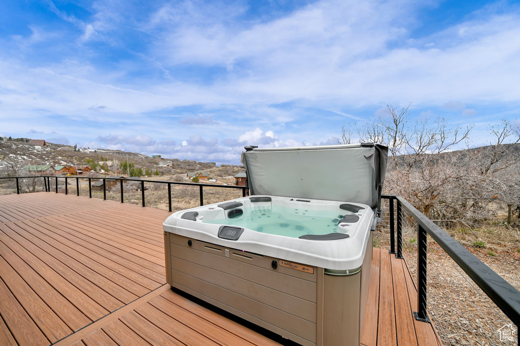 Deck featuring a hot tub