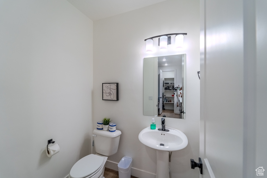 Bathroom with sink and toilet