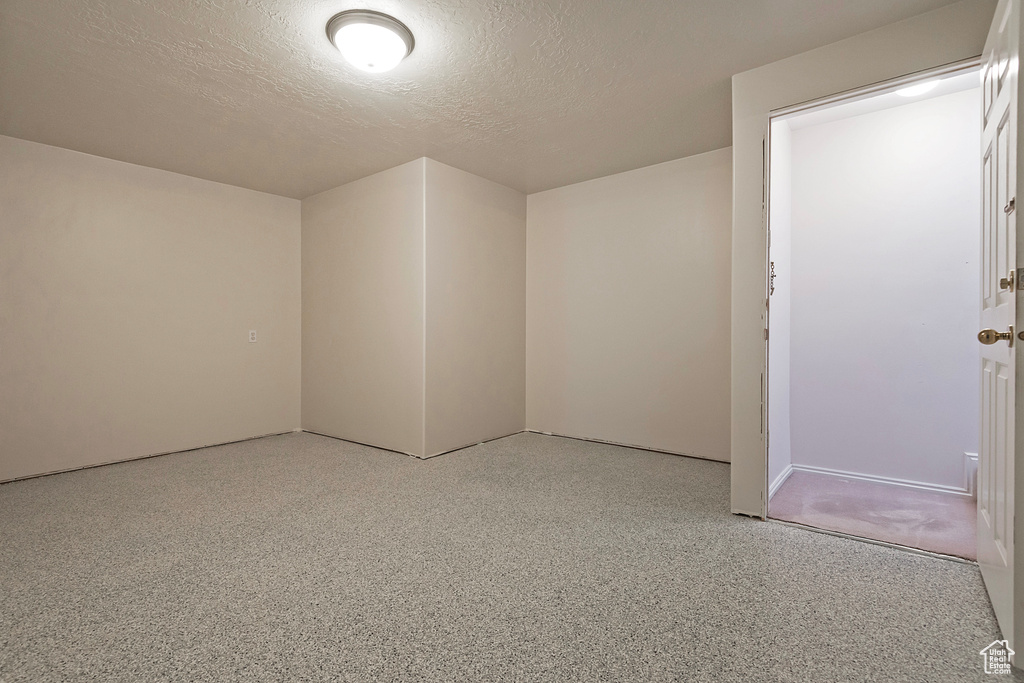 Spare room with a textured ceiling
