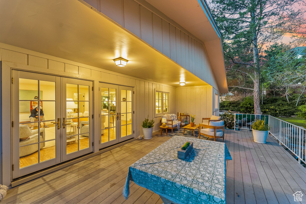 Deck at dusk with french doors