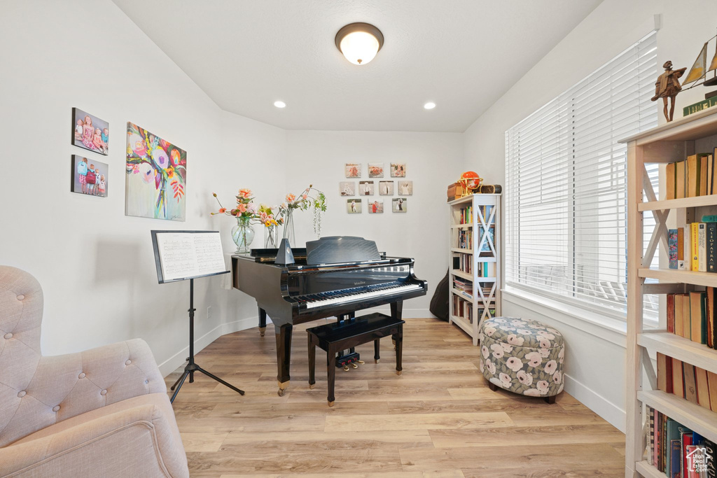 Miscellaneous room with light hardwood / wood-style floors