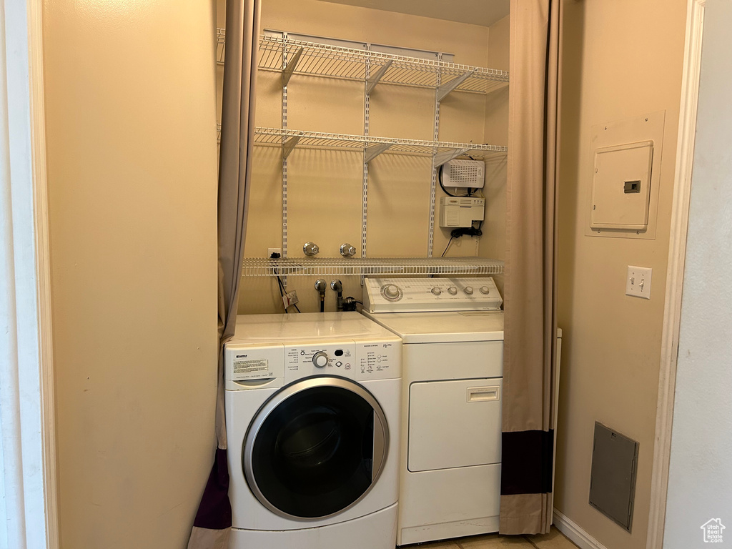 Clothes washing area with hookup for a washing machine and washing machine and clothes dryer