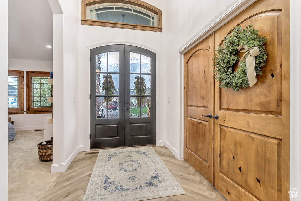Entryway featuring french doors