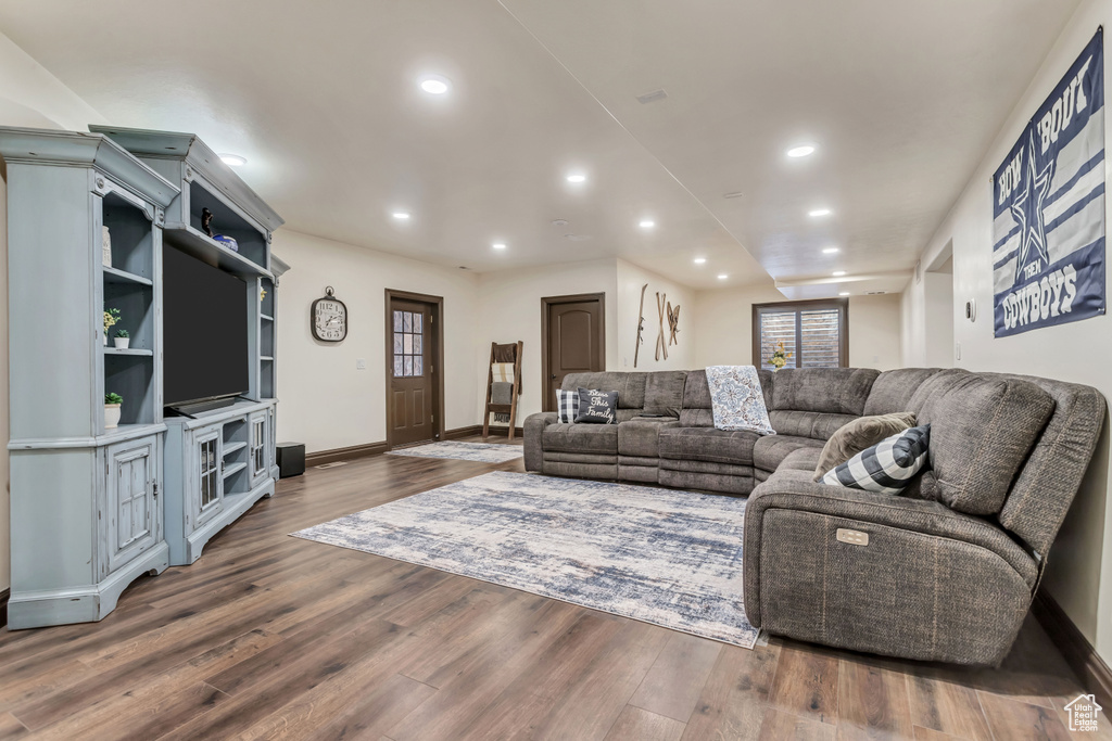Living room featuring dark hardwood / wood-style floors