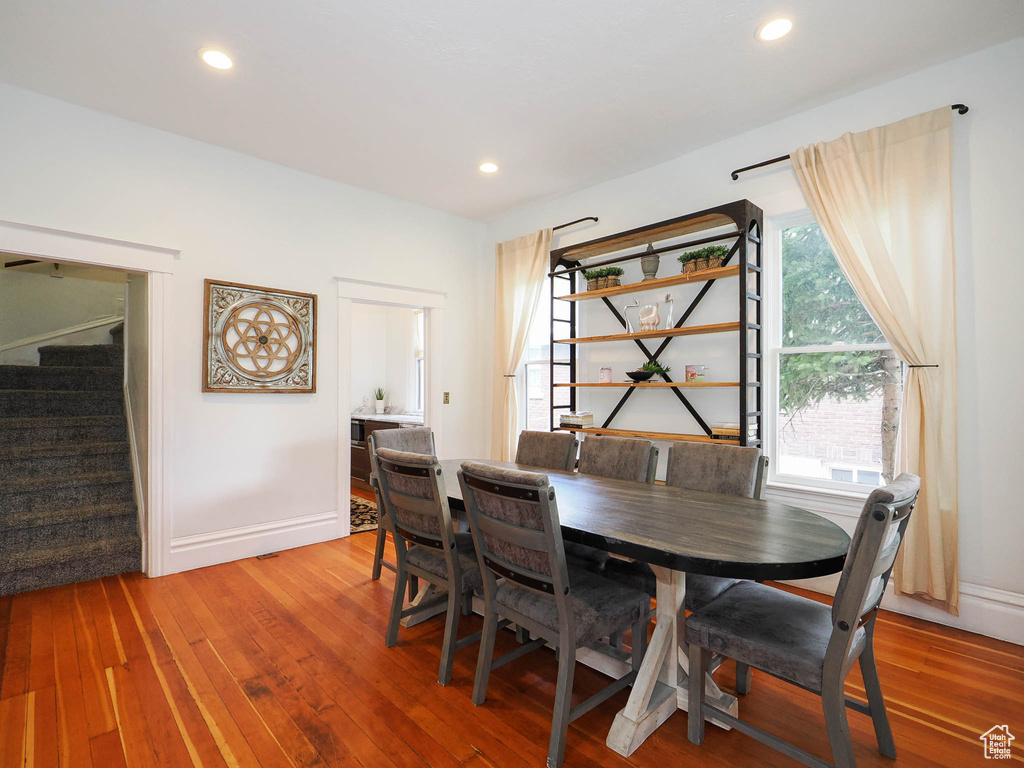 Dining space featuring hardwood / wood-style flooring