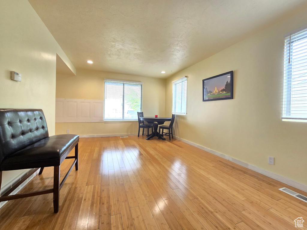 Living area featuring light hardwood / wood-style flooring