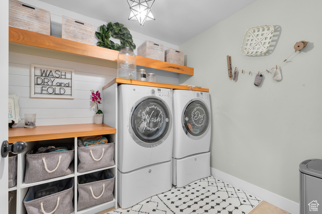 Laundry area featuring independent washer and dryer