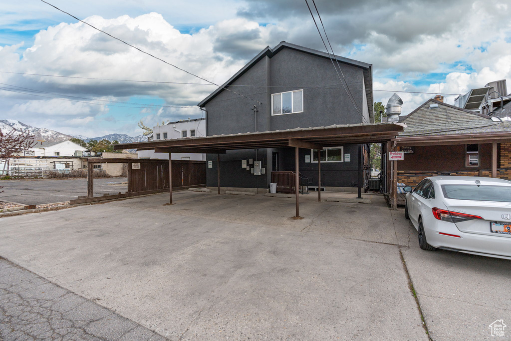 View of front of property featuring a mountain view