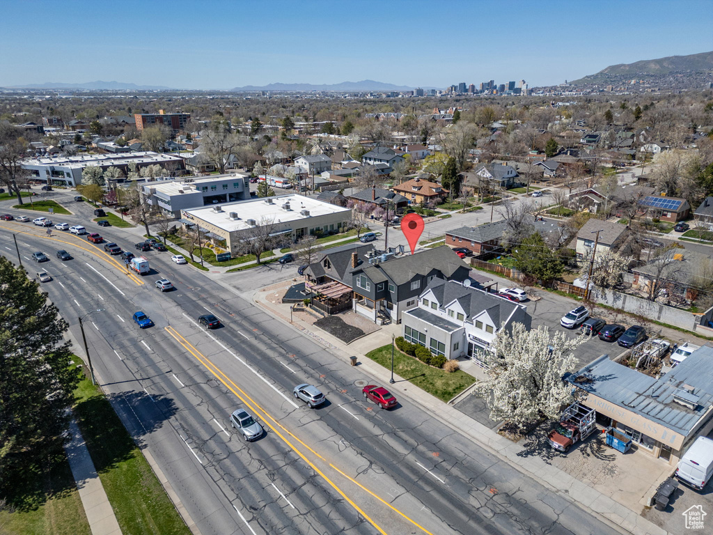 Birds eye view of property with a mountain view