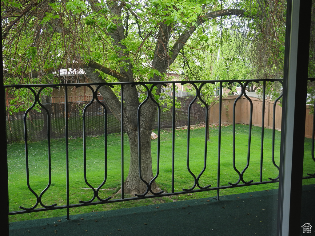 View of gate with a yard