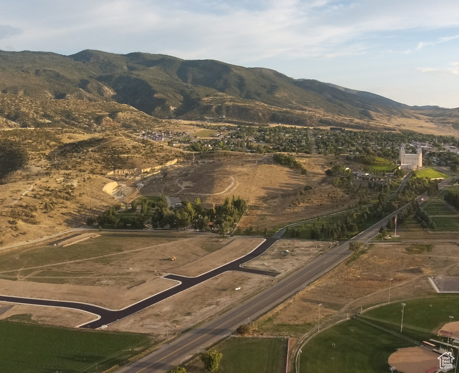 Exterior space featuring a rural view and a mountain view