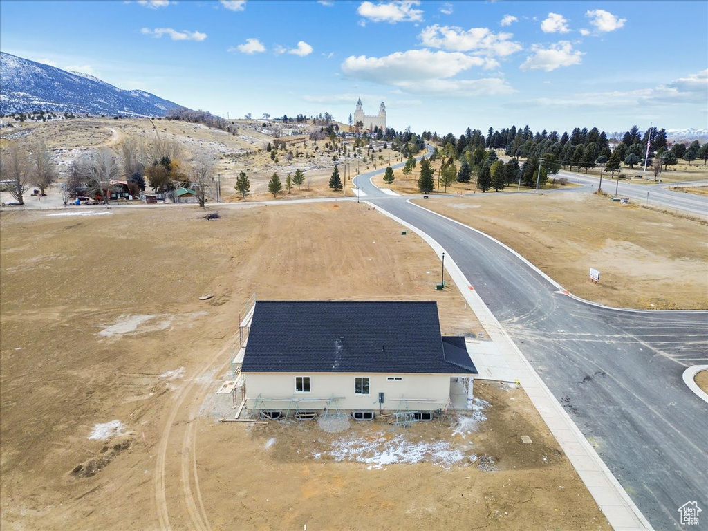 Drone / aerial view featuring a mountain view