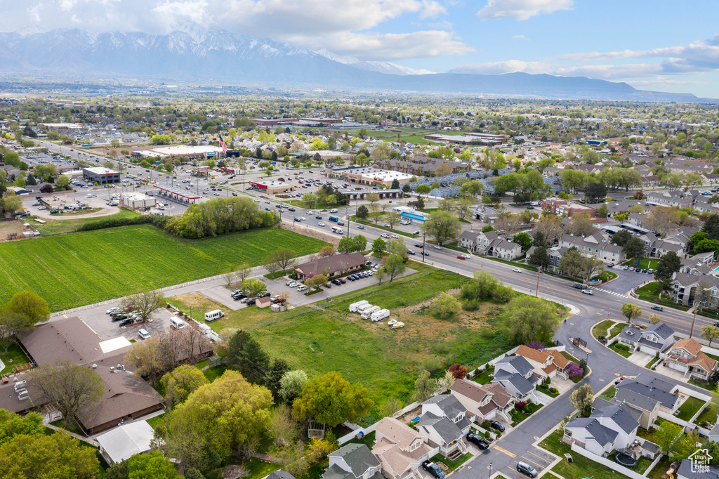 Birds eye view of property with a mountain view