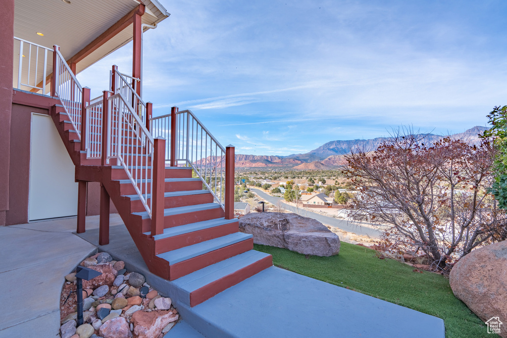 Stairway featuring a mountain view