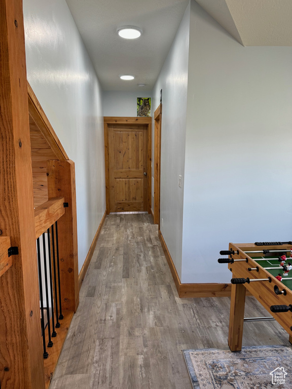 Hallway featuring hardwood / wood-style flooring