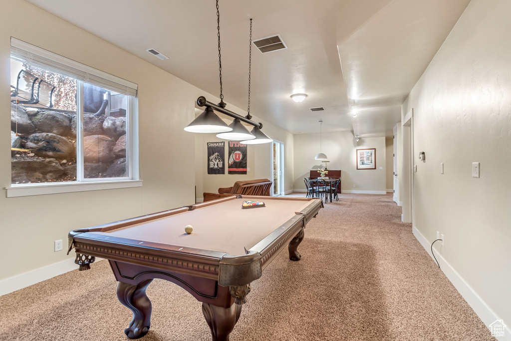 Recreation room with carpet flooring and billiards