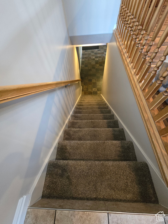 Staircase with tile floors