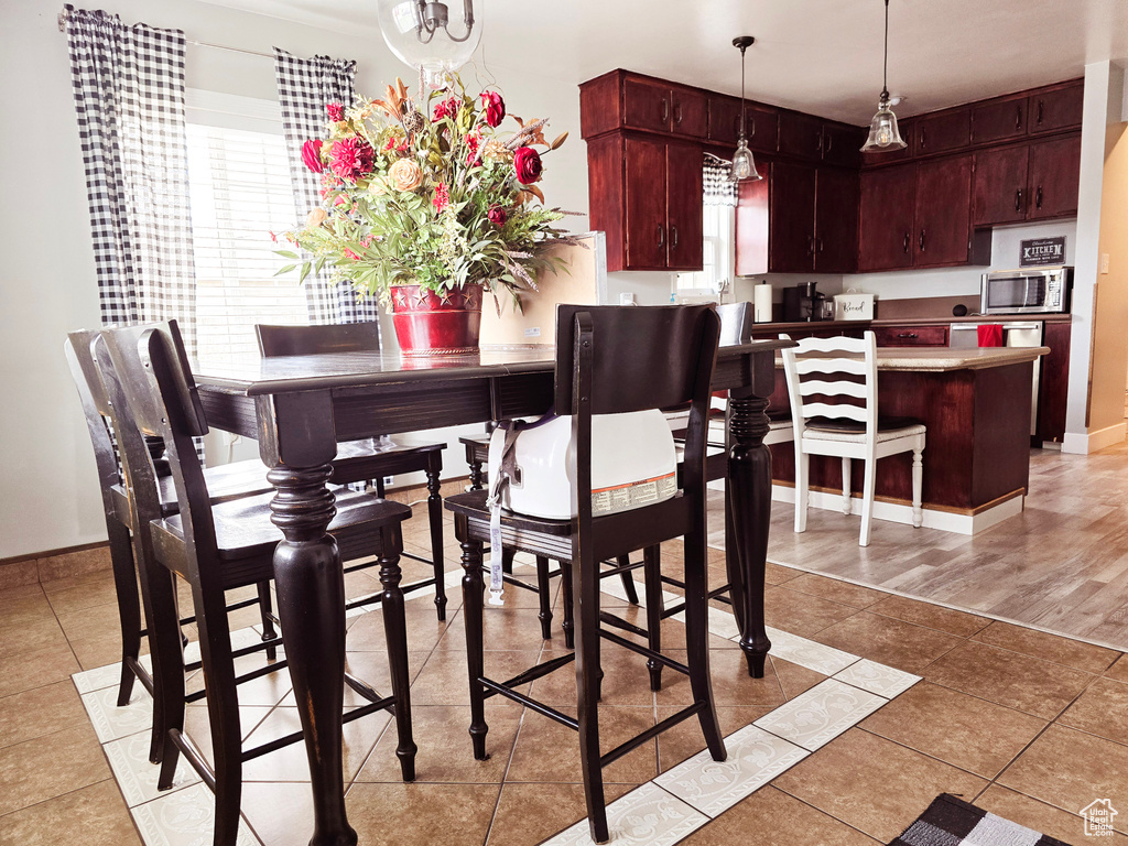 Dining space featuring light hardwood / wood-style flooring