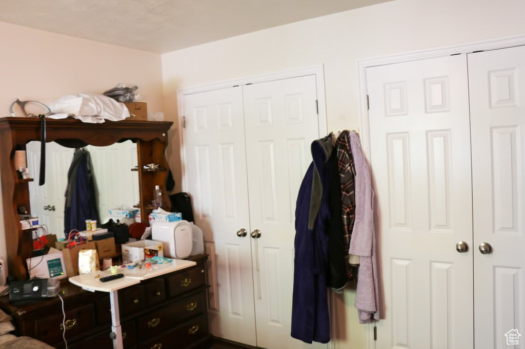 Bedroom featuring two closets