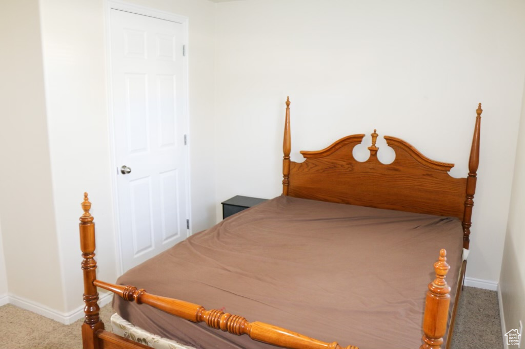 Bedroom featuring carpet floors