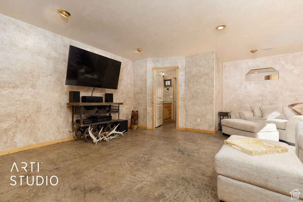 Living room featuring concrete floors