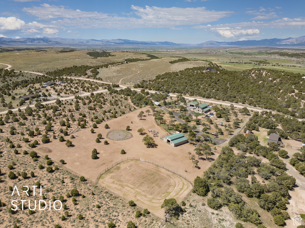 Drone / aerial view with a mountain view and a rural view