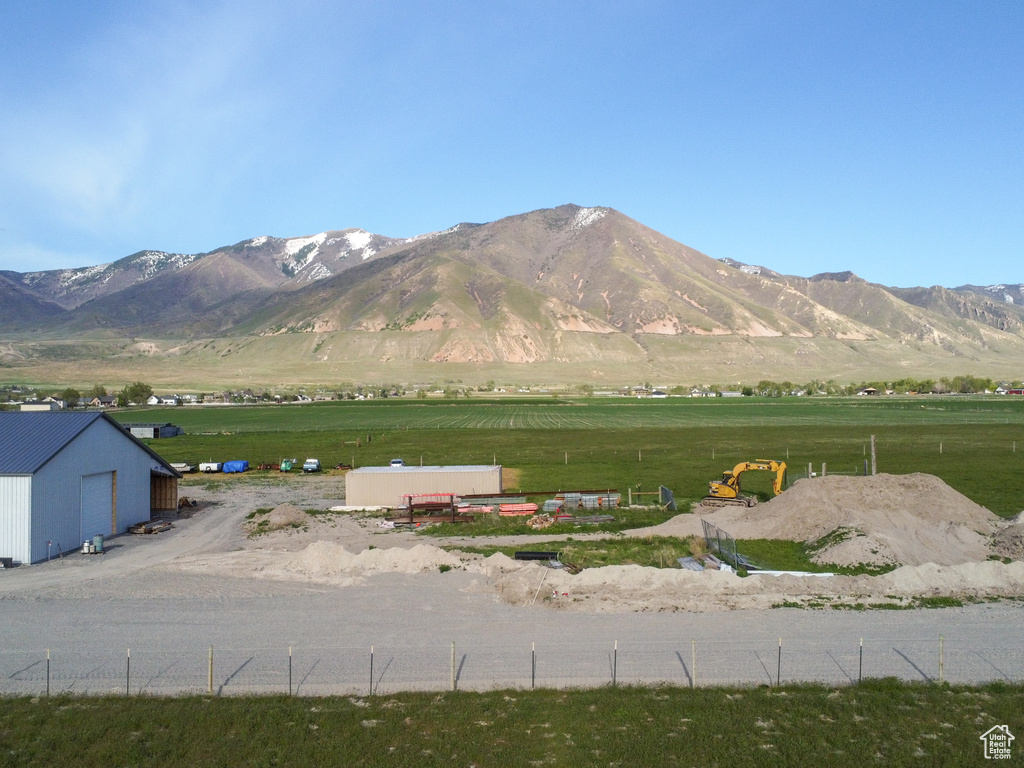 Property view of mountains with a rural view