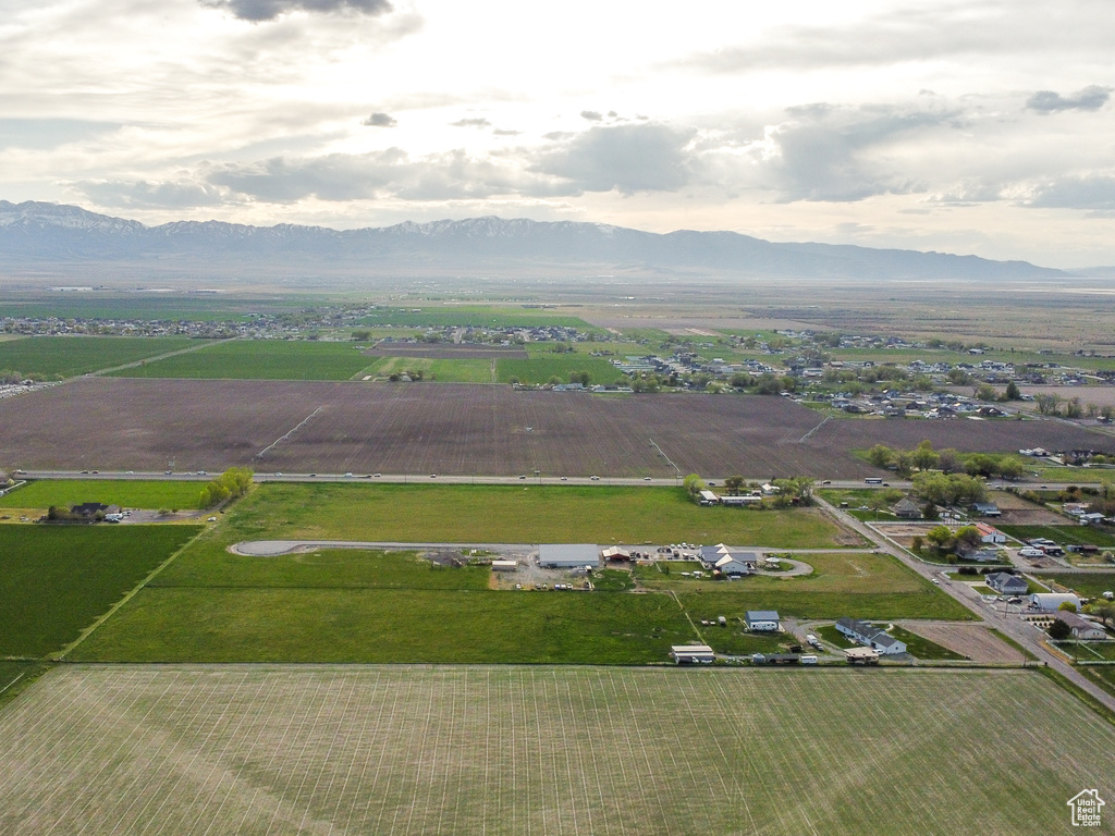 Drone / aerial view with a mountain view and a rural view