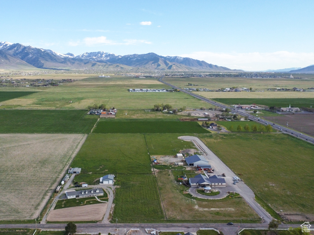 Birds eye view of property featuring a mountain view and a rural view