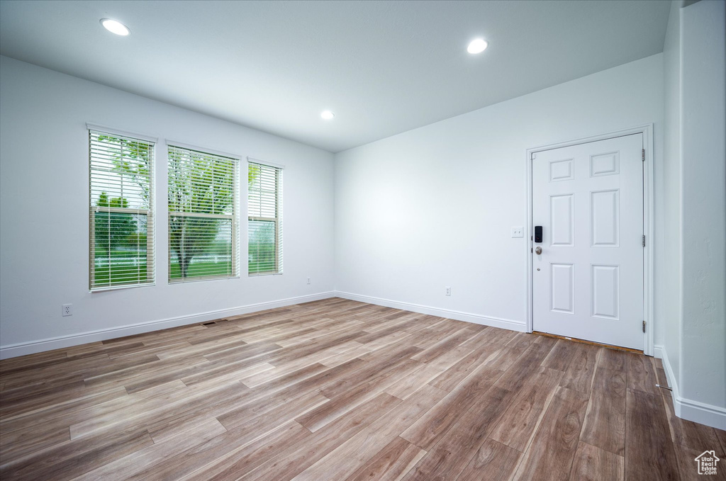 Empty room with wood-type flooring
