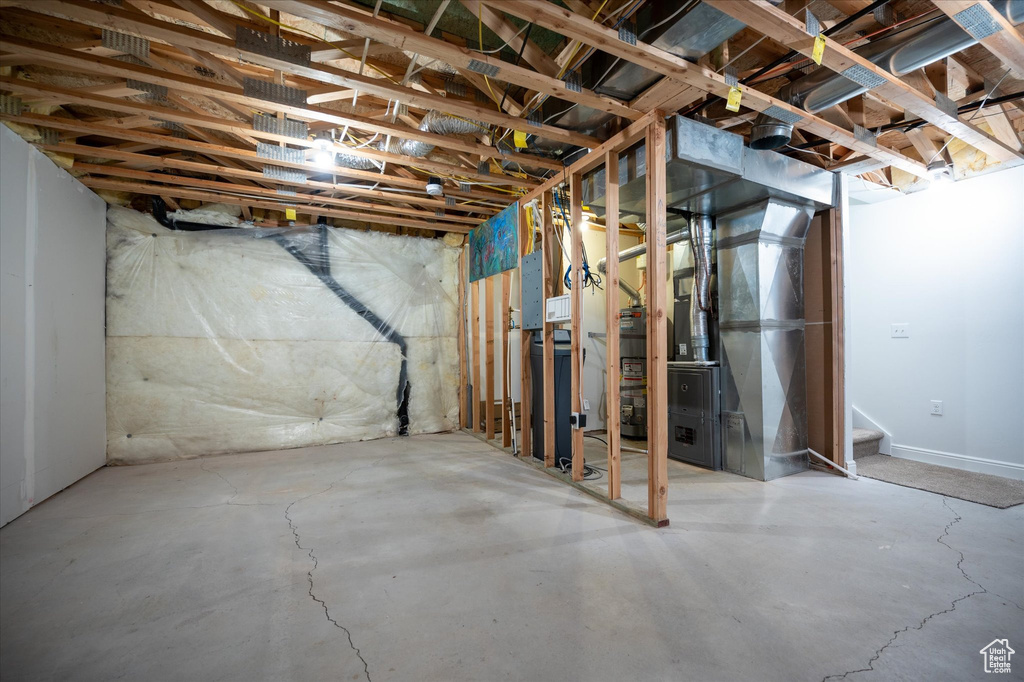 Basement with water heater and heating utilities