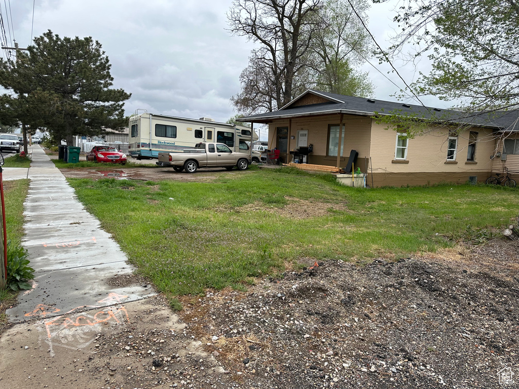 Exterior space with a front yard