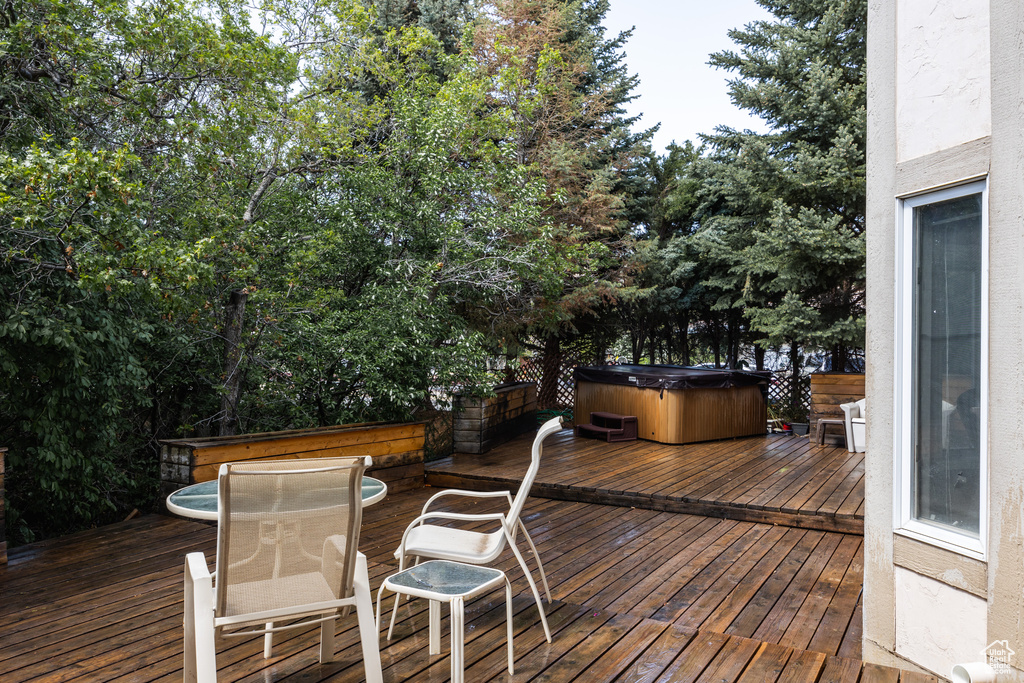 Deck featuring a hot tub