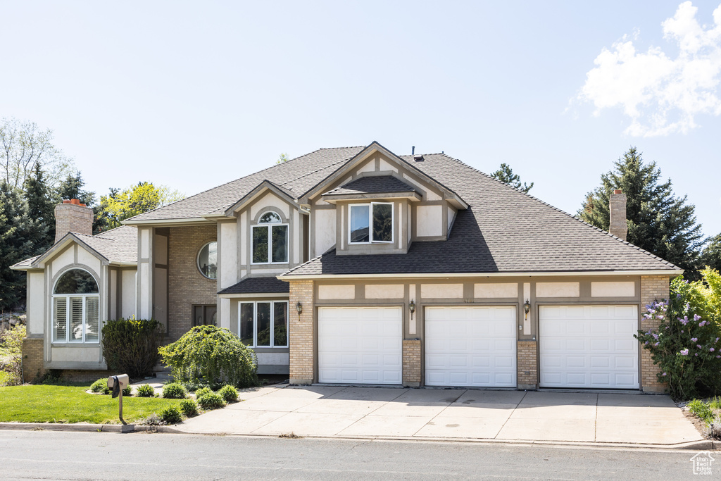 View of front of home featuring a garage