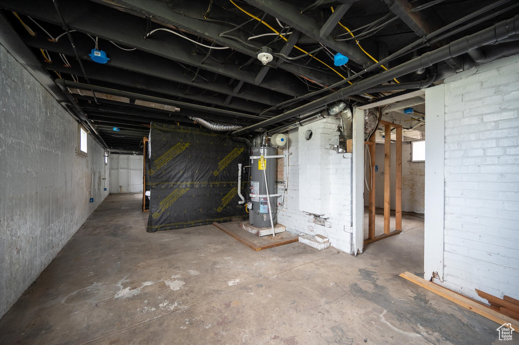 Basement with strapped water heater
