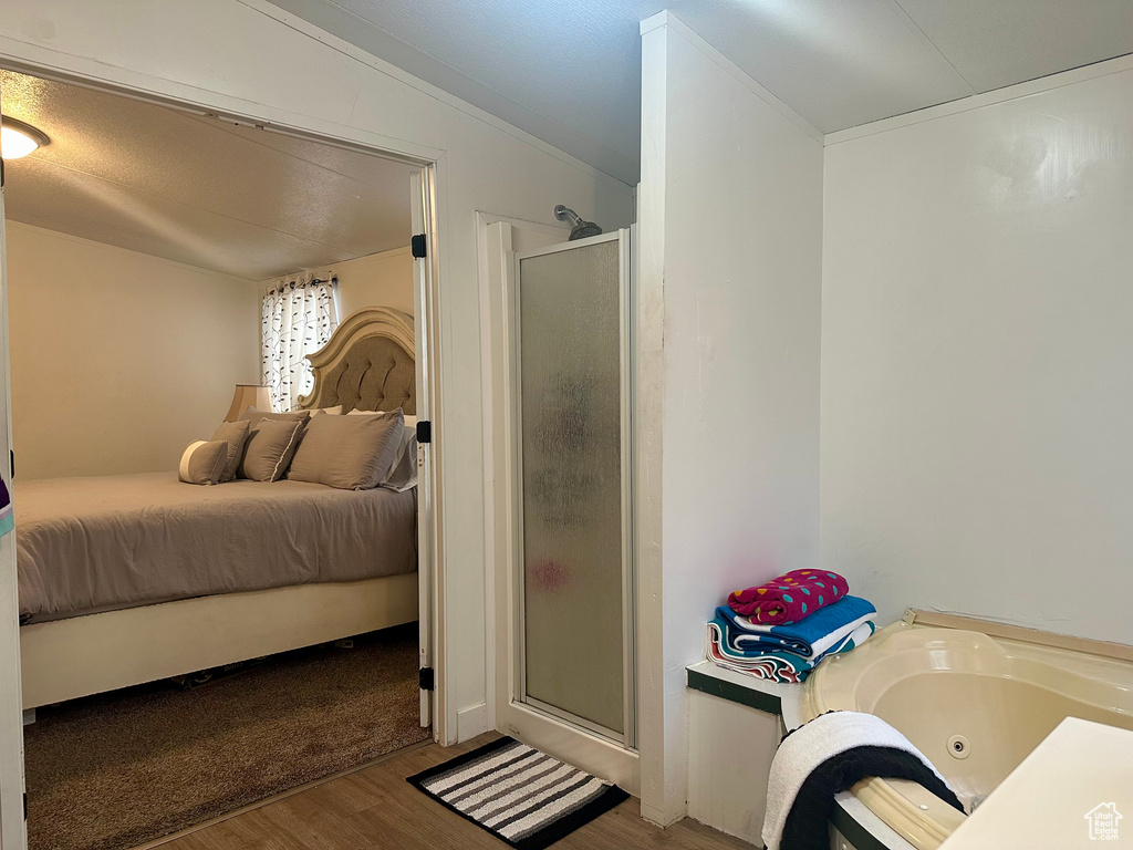 Bedroom featuring hardwood / wood-style floors