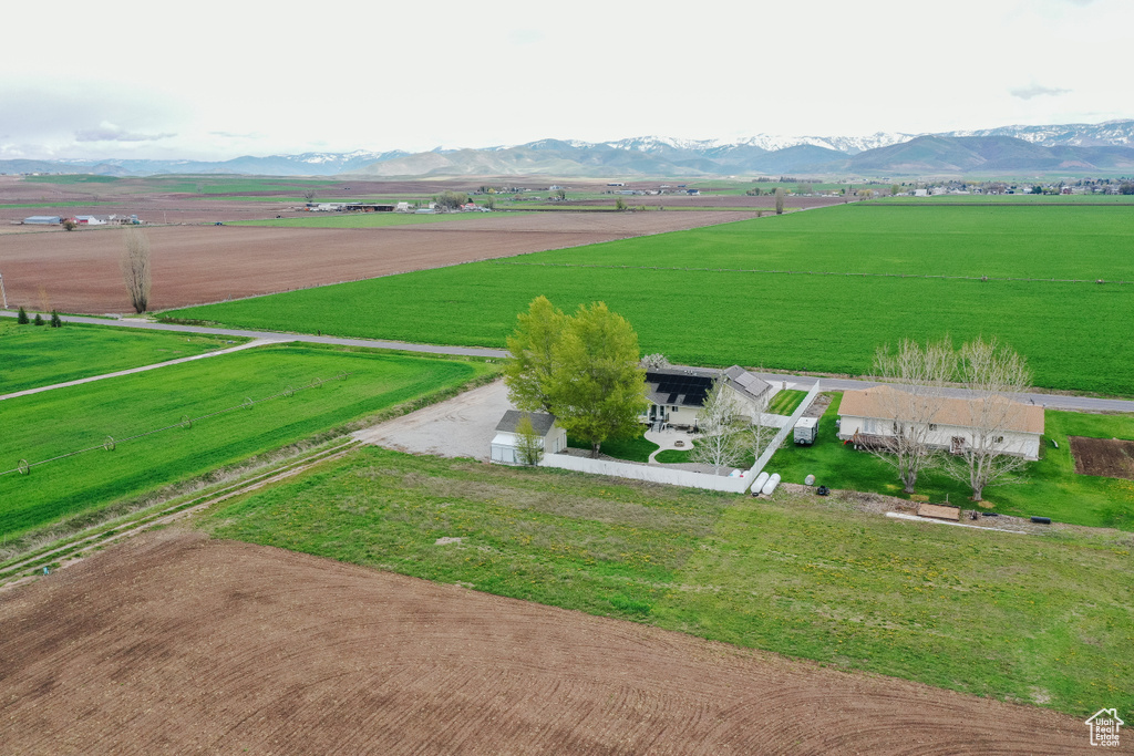 Birds eye view of property with a mountain view and a rural view