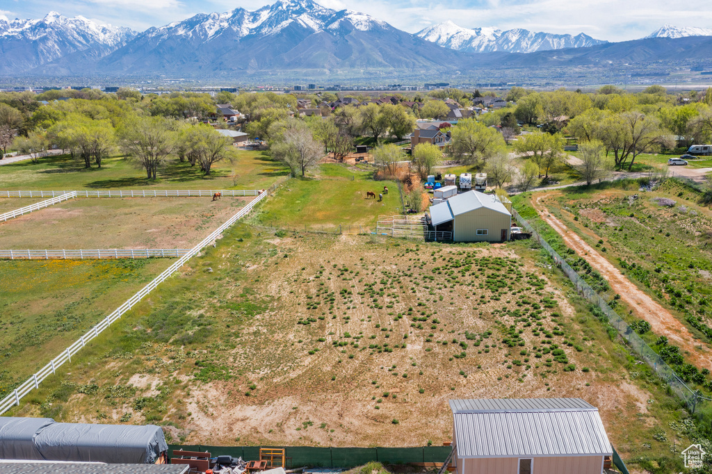 Drone / aerial view featuring a mountain view and a rural view