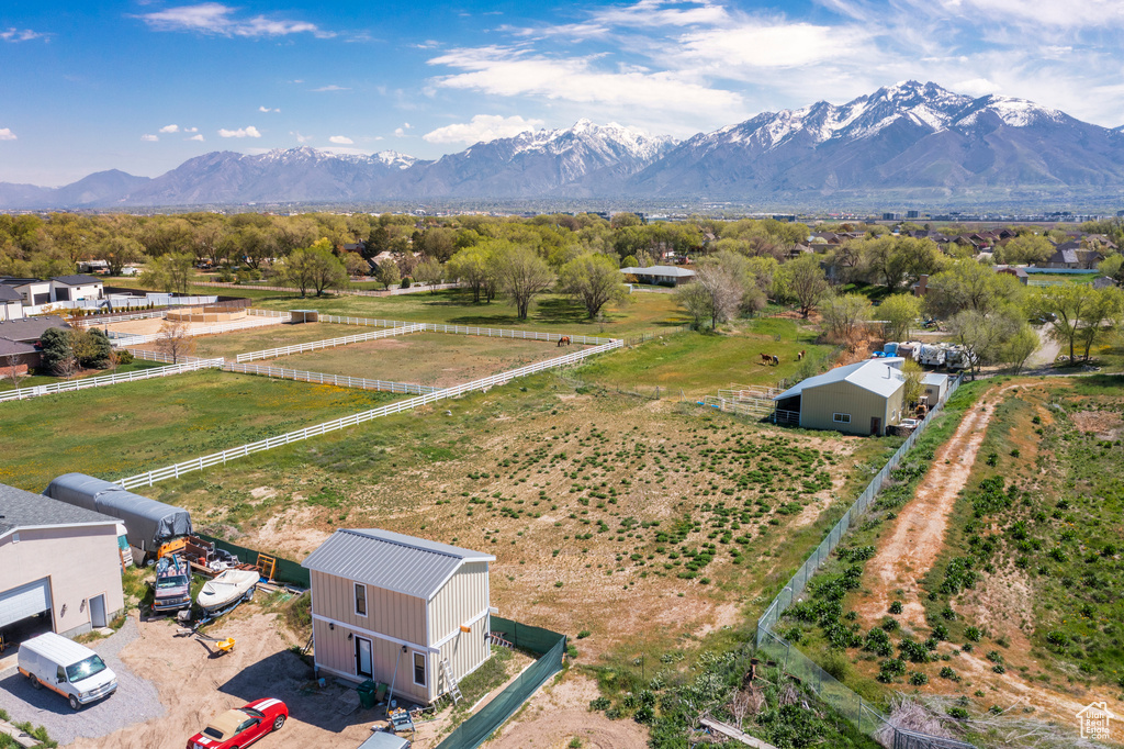 Birds eye view of property with a mountain view