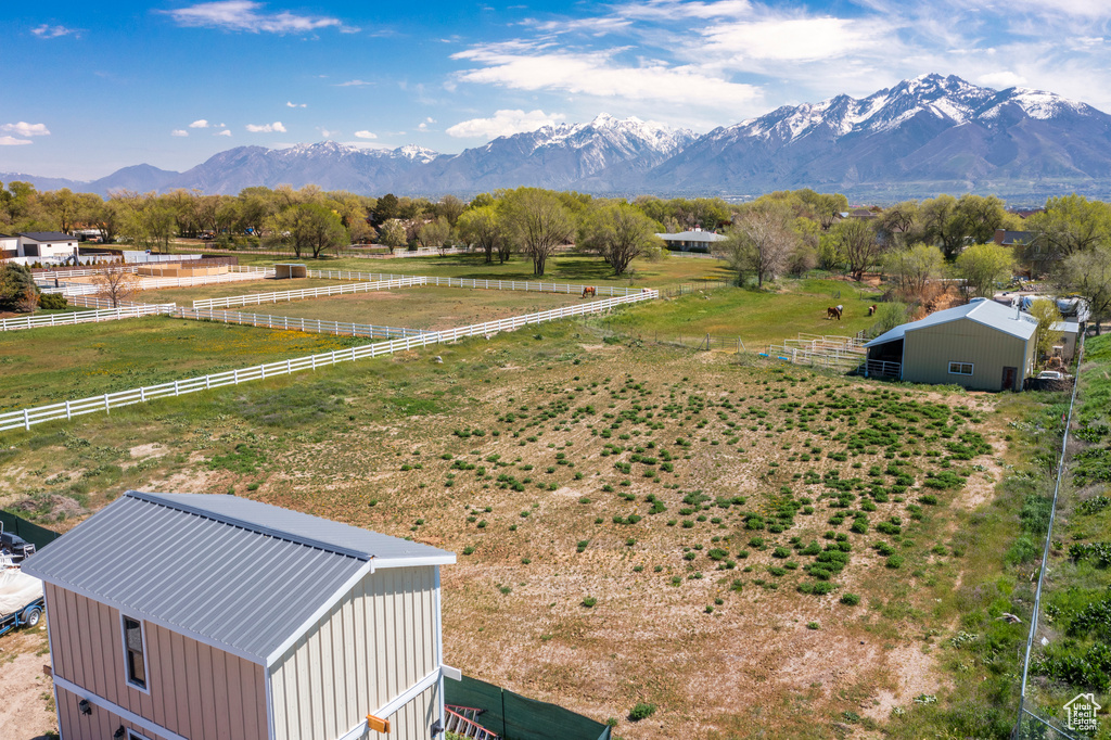 Property view of mountains with a rural view