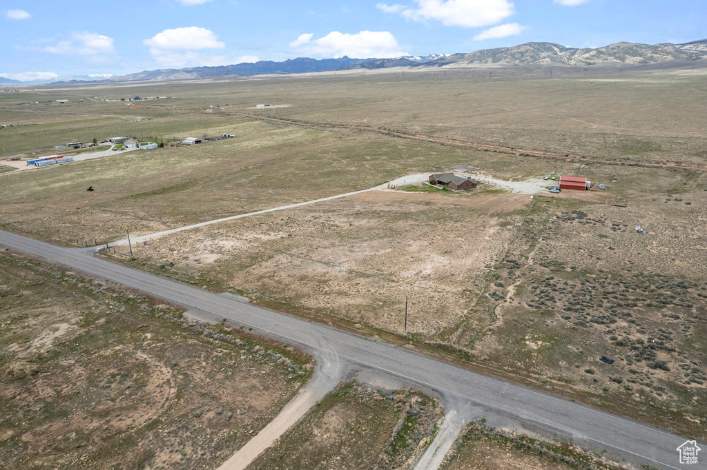 Drone / aerial view with a mountain view and a rural view