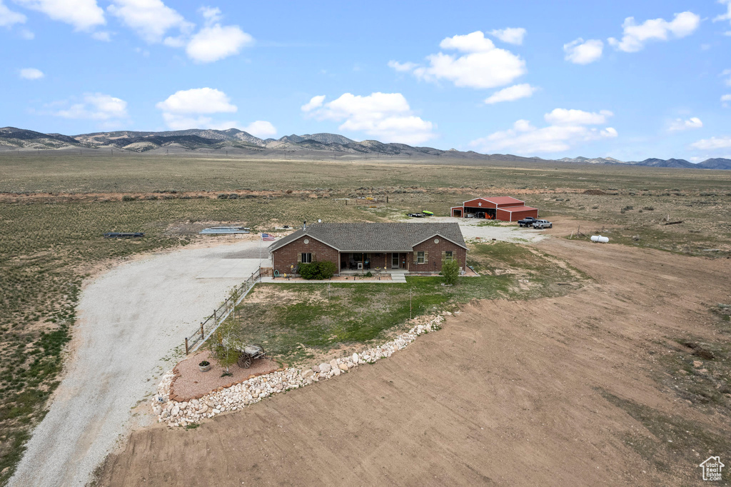 Birds eye view of property featuring a mountain view