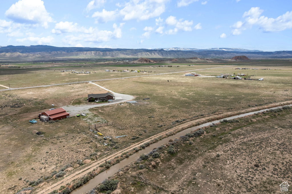 Birds eye view of property featuring a rural view and a mountain view